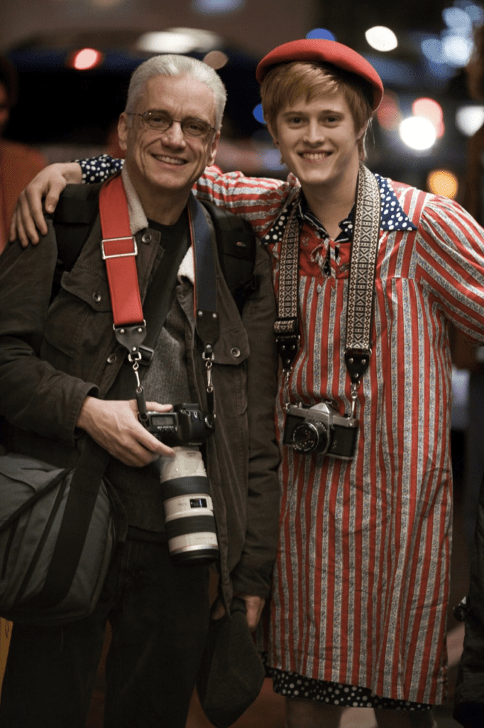The real Danny Nicoletta (left) visits actor Lucas Grabeel on the set of Milk.
