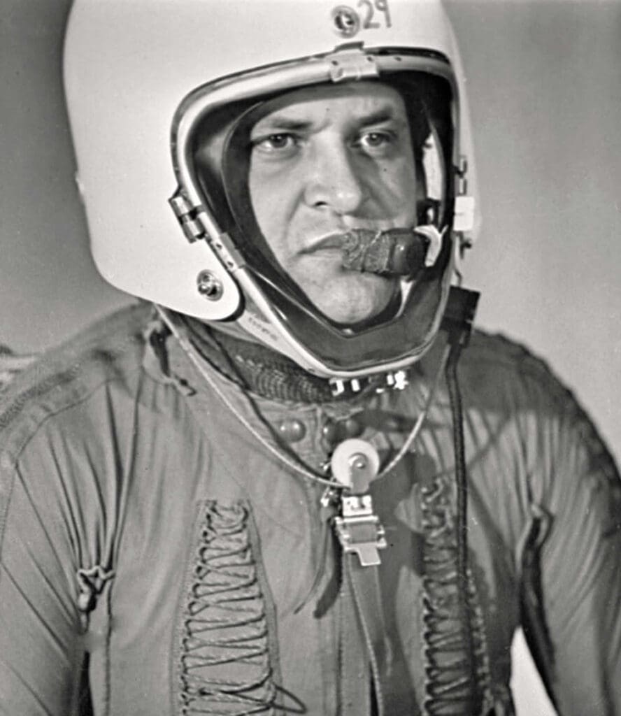 Francis 'Gary' Powers in a pressurised flight suit, and a large white helmet.