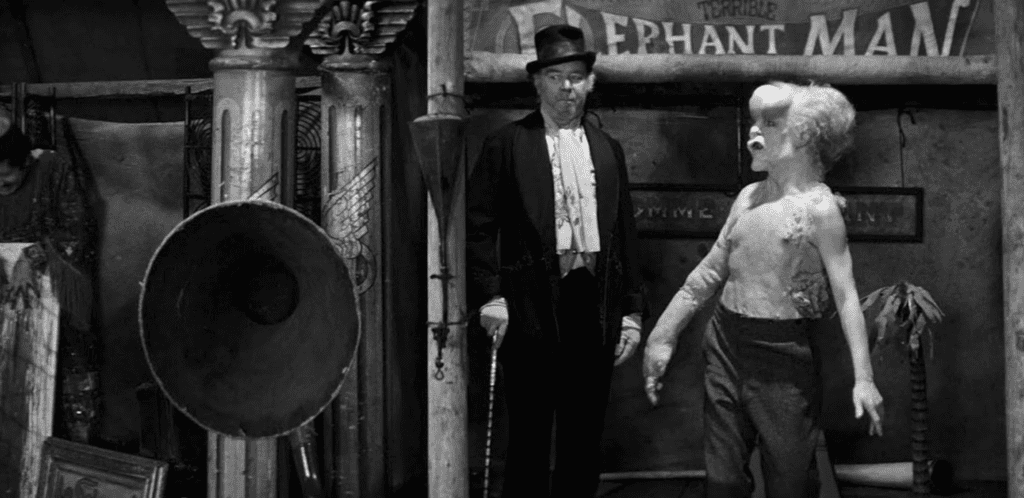 Freddie Jones as Bytes (left) and John Hurt as John Merrick (right) in David Lynch's The Elephant Man (1980). Photo courtesy of Brooksfilms / Paramount Pictures. All Rights Reserved.