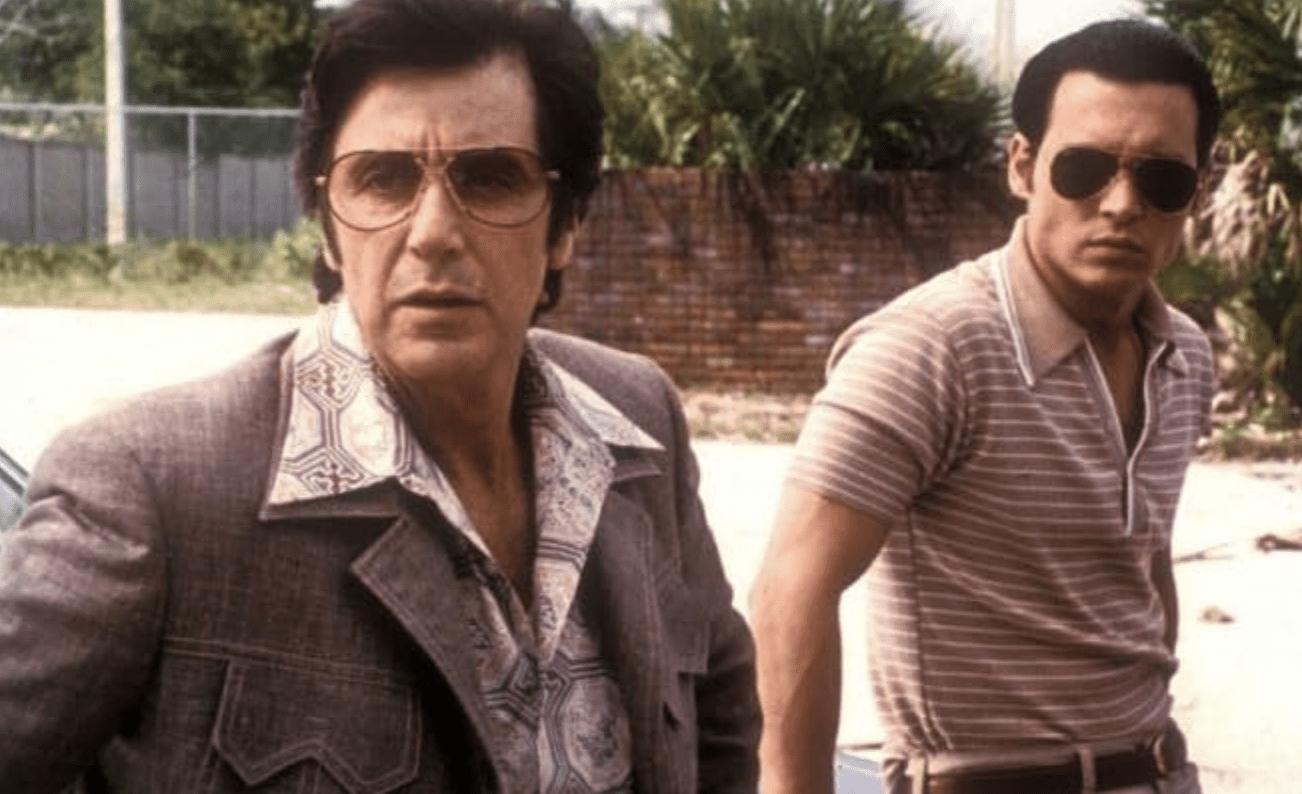 Johnny Depp and Al Pacino capture the tragic, high-stakes relationship between an undercover FBI agent and a veteran mafia soldier in Donnie Brasco (1997).